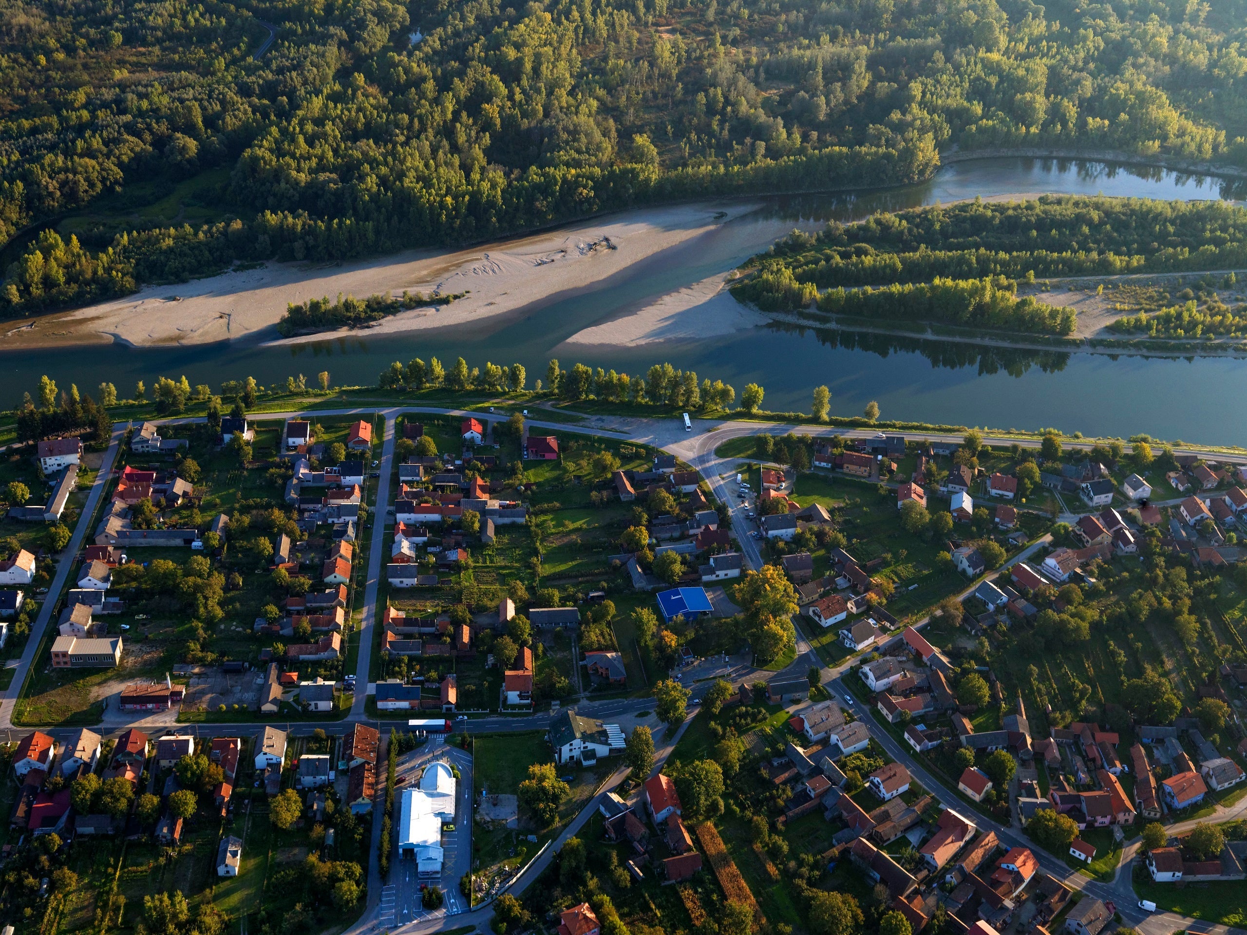 High Angle View Of River Amidst Buildings In City