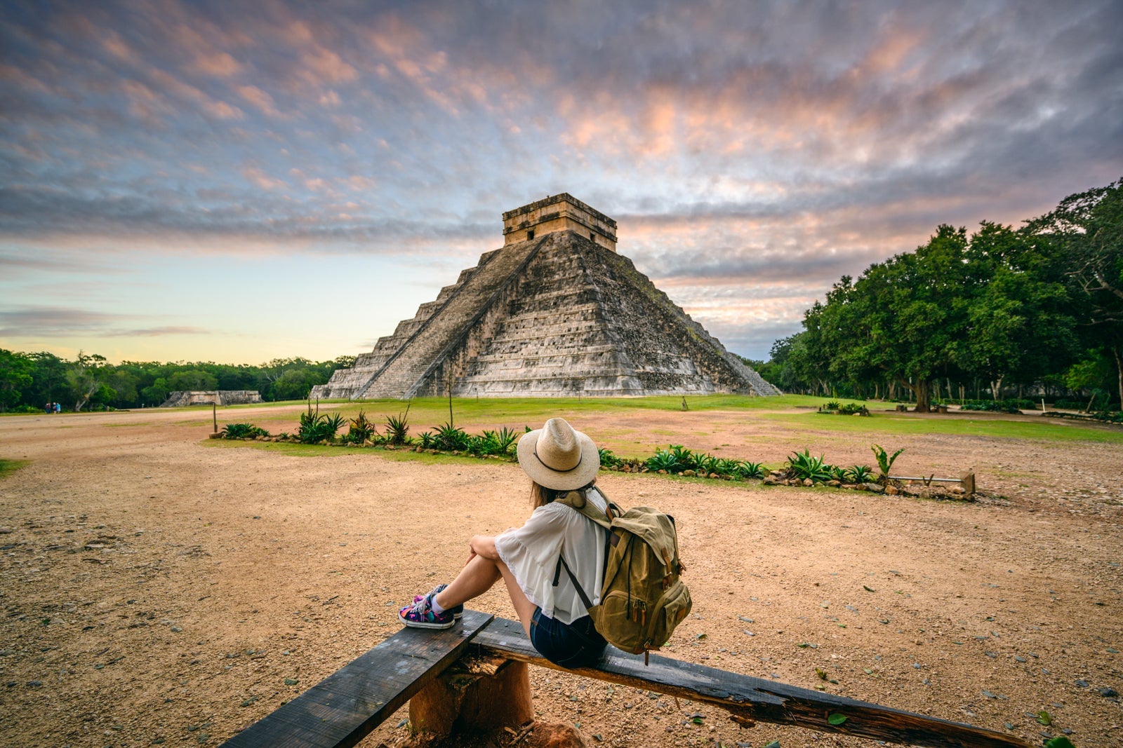 Tourist exploring Chichen-Itza archaeological site, Yucatan, Mexico