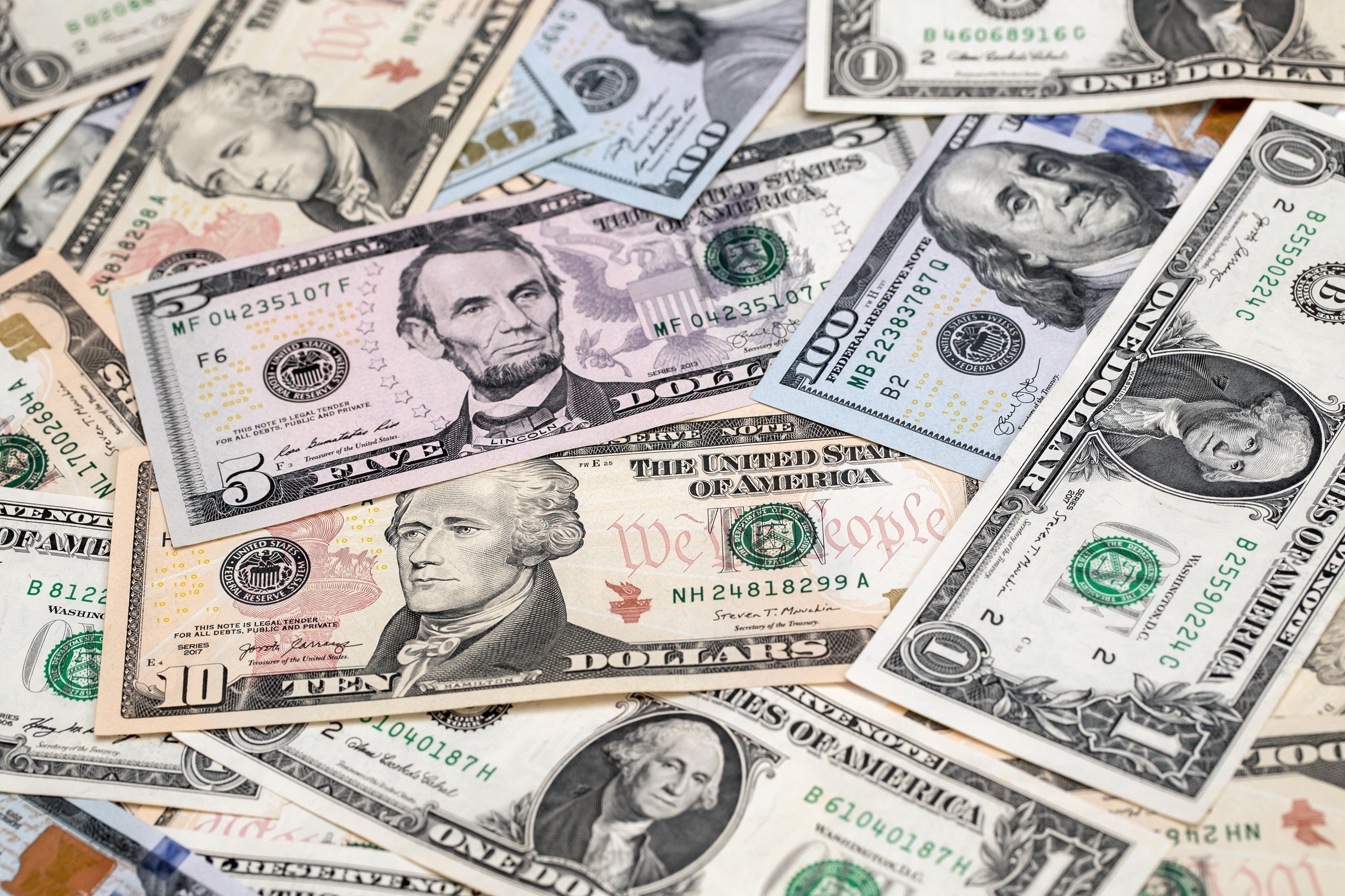 Hong Kong Dollar, Chinese Yuan and US Dollar Banknotes As Currency Peg Intervention From HKMA Continues Into Third Day