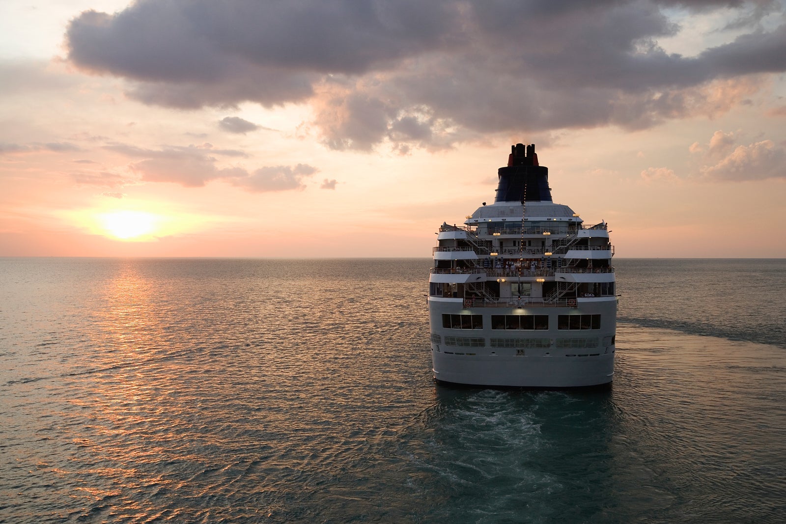 Cruise ship in sea at dusk