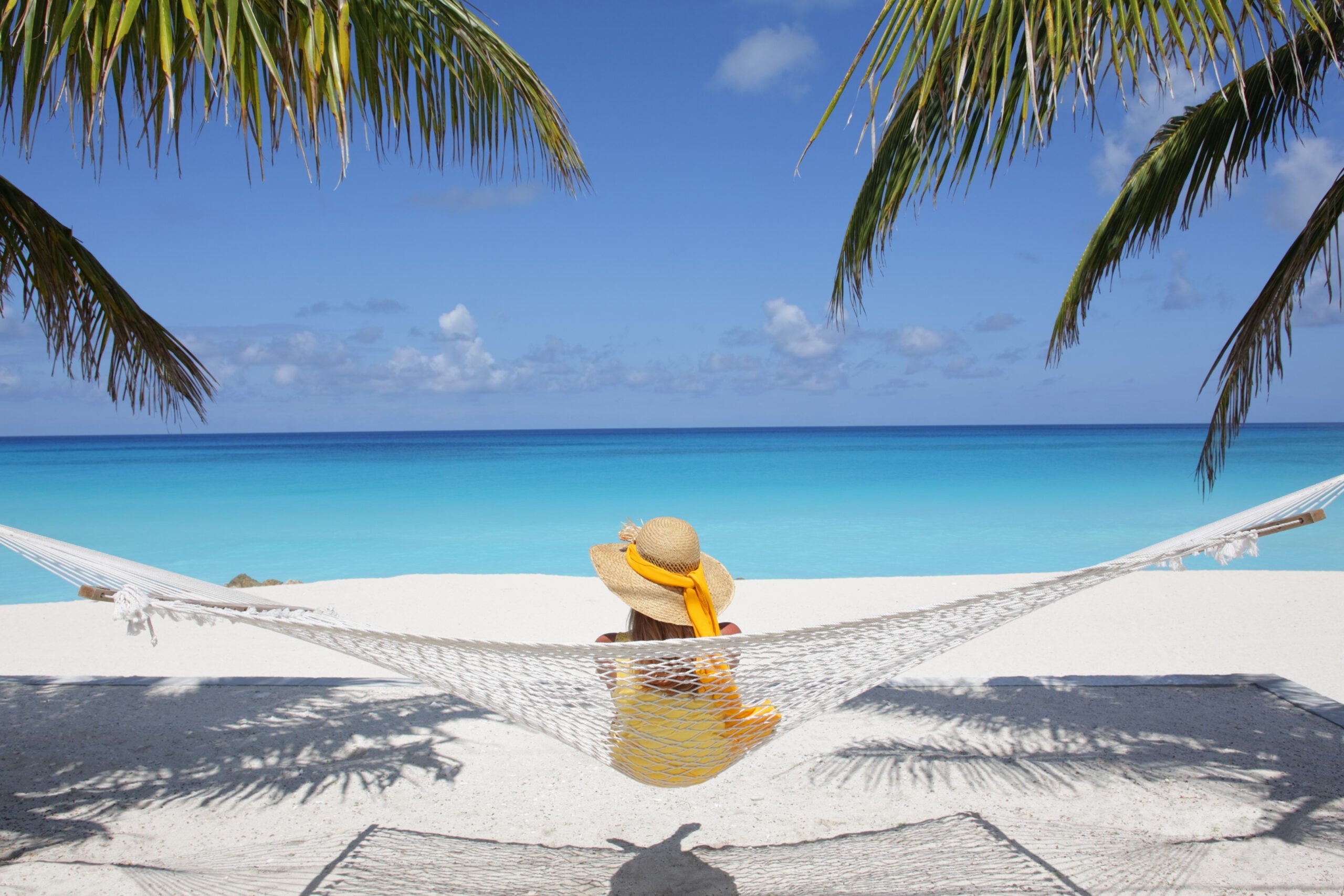 Woman looking out at the ocean in the Bahamas. (Photo by Dorgie Productions)