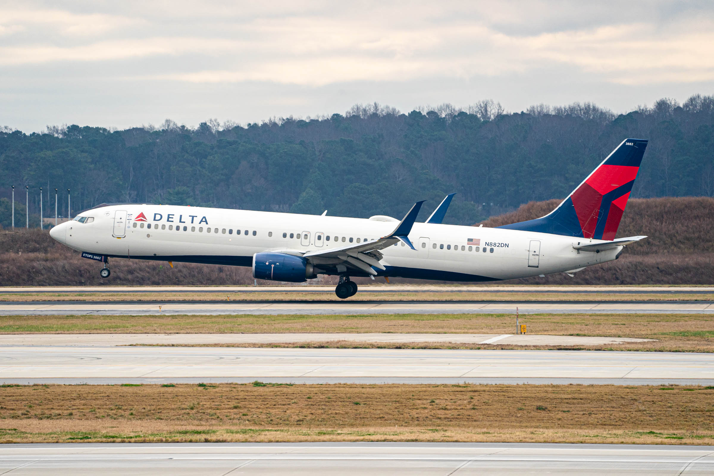Delta Boeing 737-900 ATL Cloudy Landing TPGStock-1