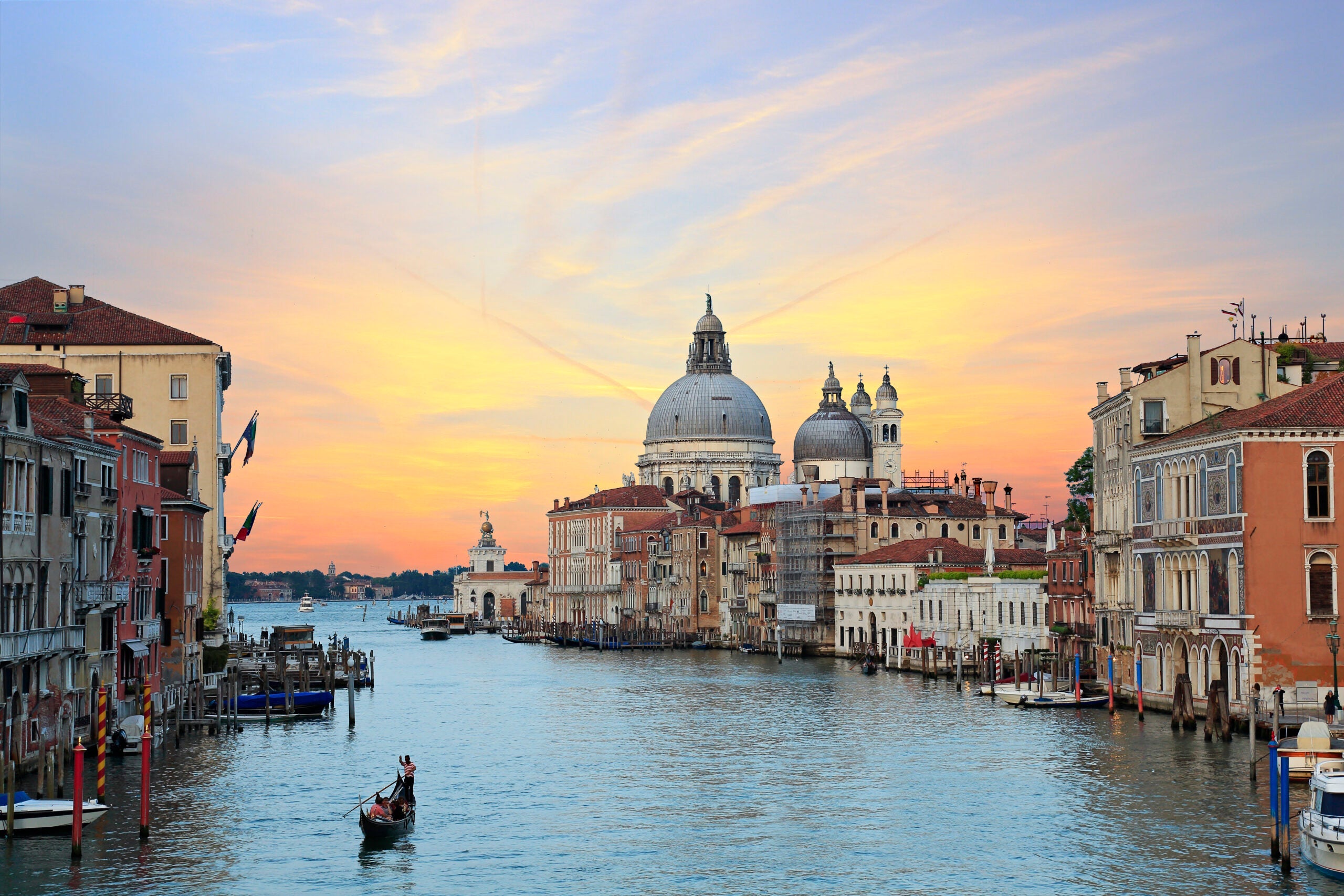 Gondola in the Grand Canal at sunset