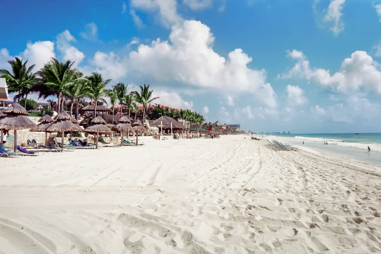 View Of Beach Against Cloudy Sky