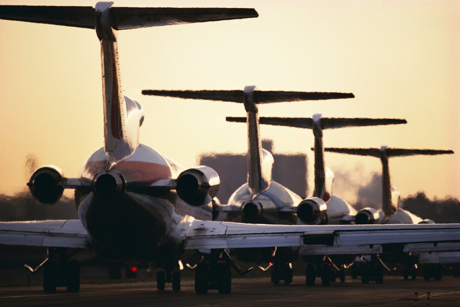 Airline Jets Lined up on Runway