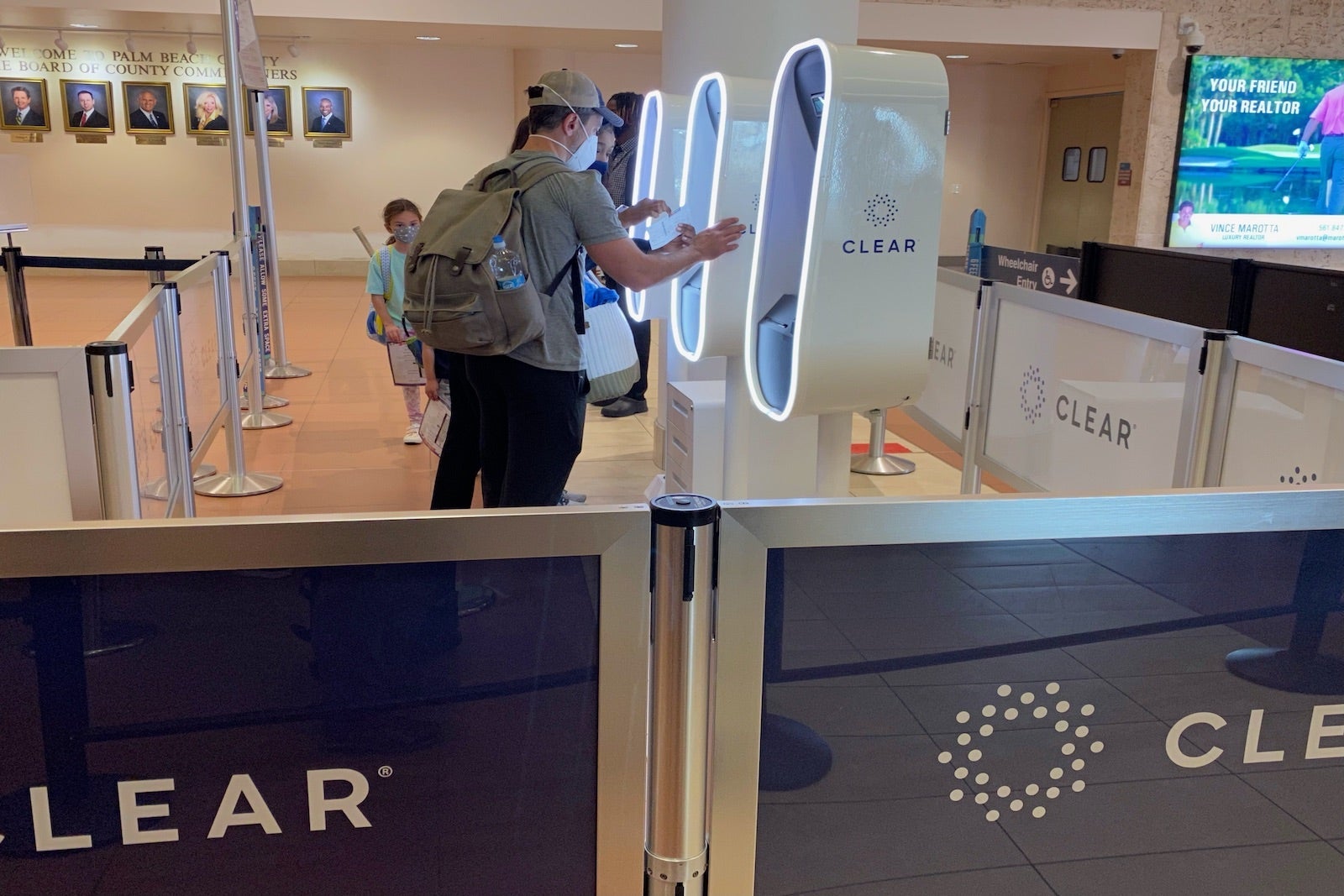 Passengers using CLEAR kiosk that allows quick and secure Identity confirmation, West Palm Beach Airport, Florida