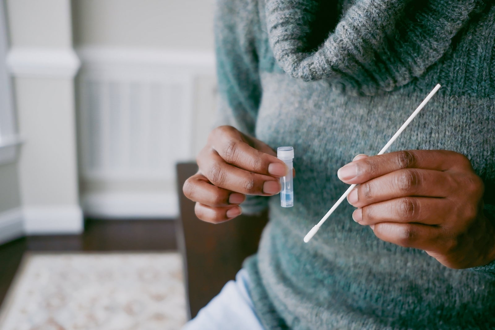 Woman Takes At-Home COVID Test