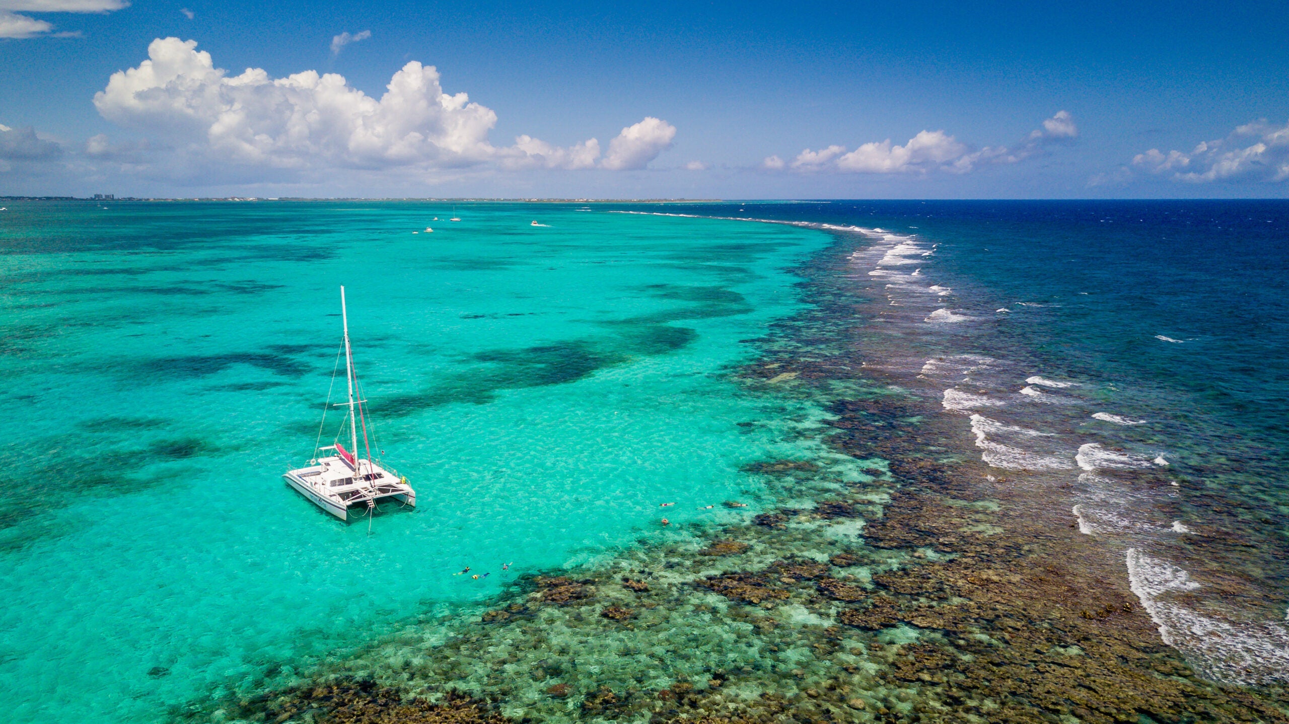 Sailboat In Sea Against Sky