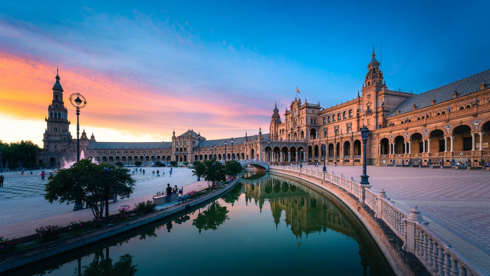 Plaza de España in Seville with Dramatic Colorful Clouds at Sunset