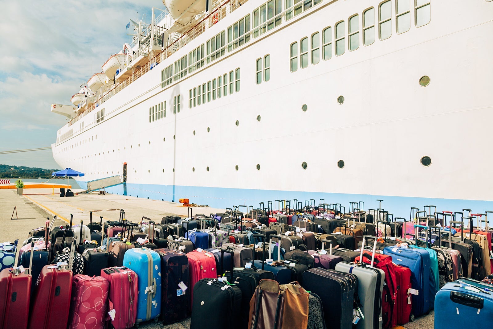 Suitcases and cruise ship at pier (XXXL)