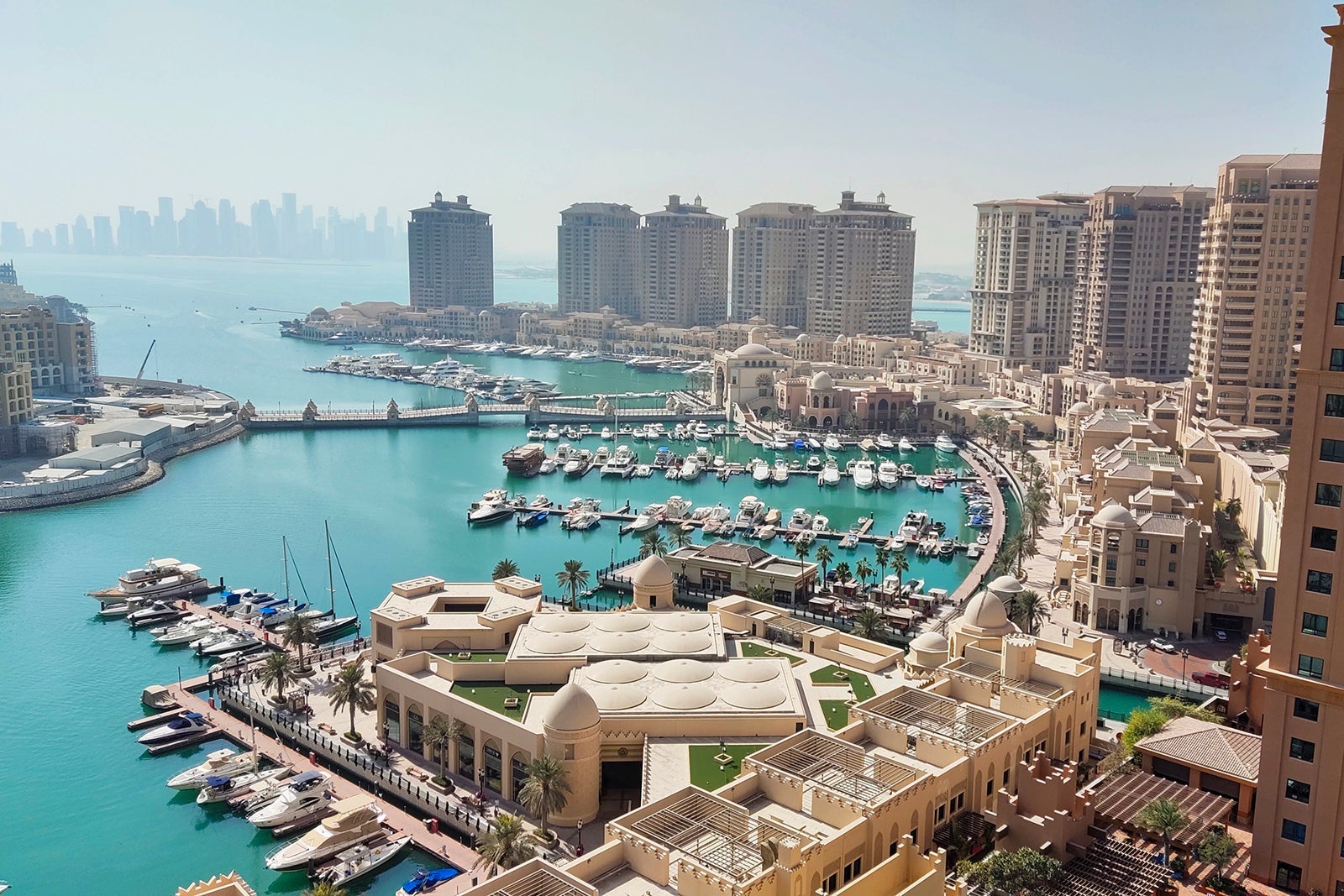 High angle view of buildings by sea against sky,Doha,Qatar