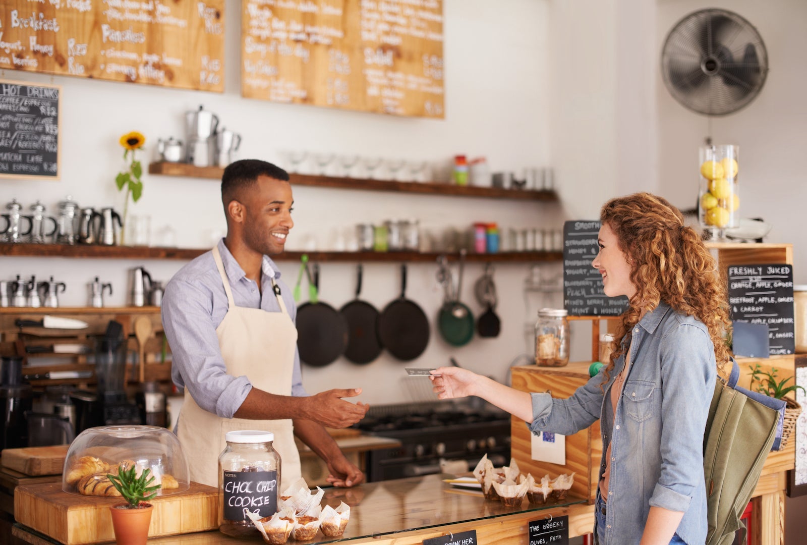 Woman buying something from a cafe