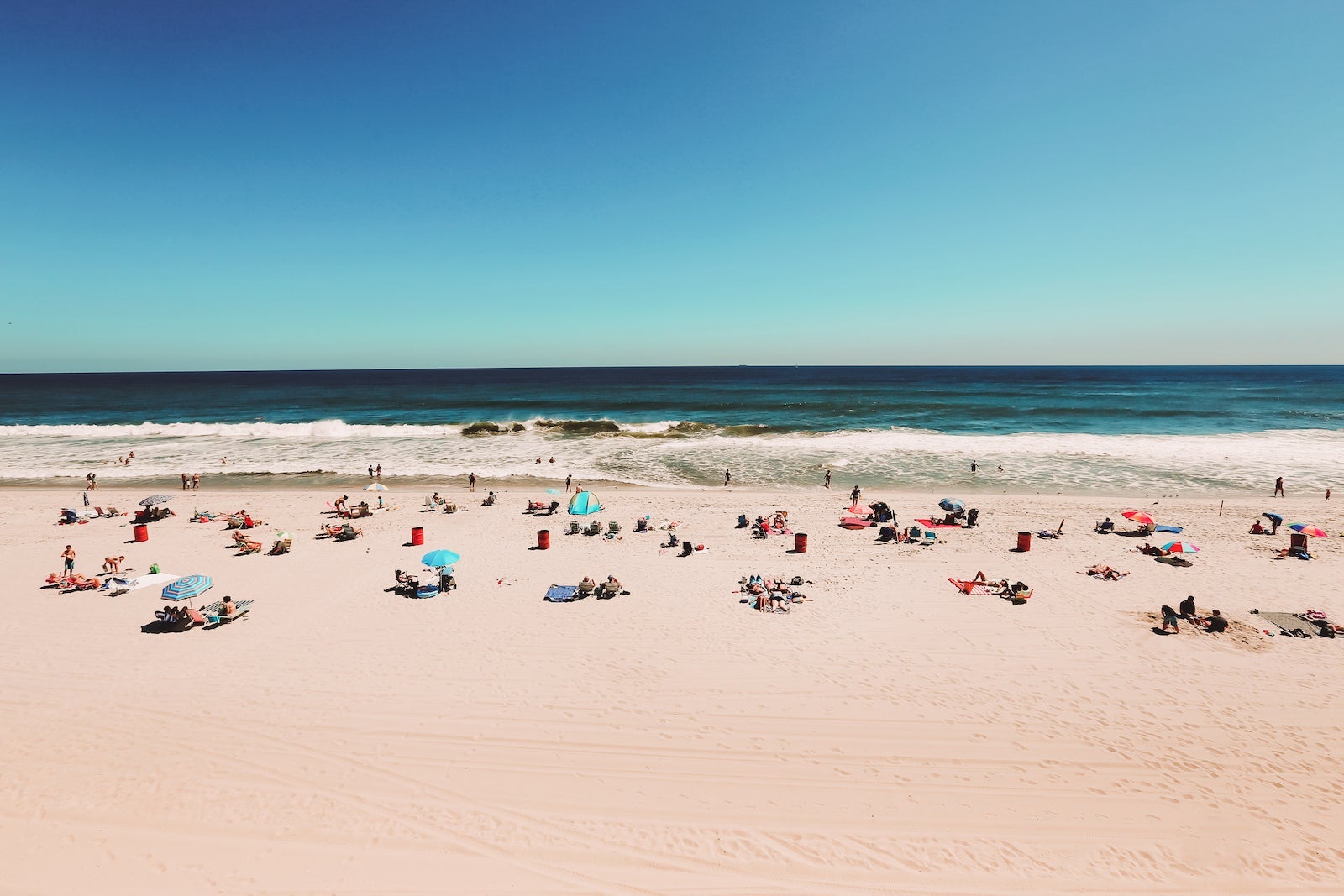 People on beach during summer vacation or spring break