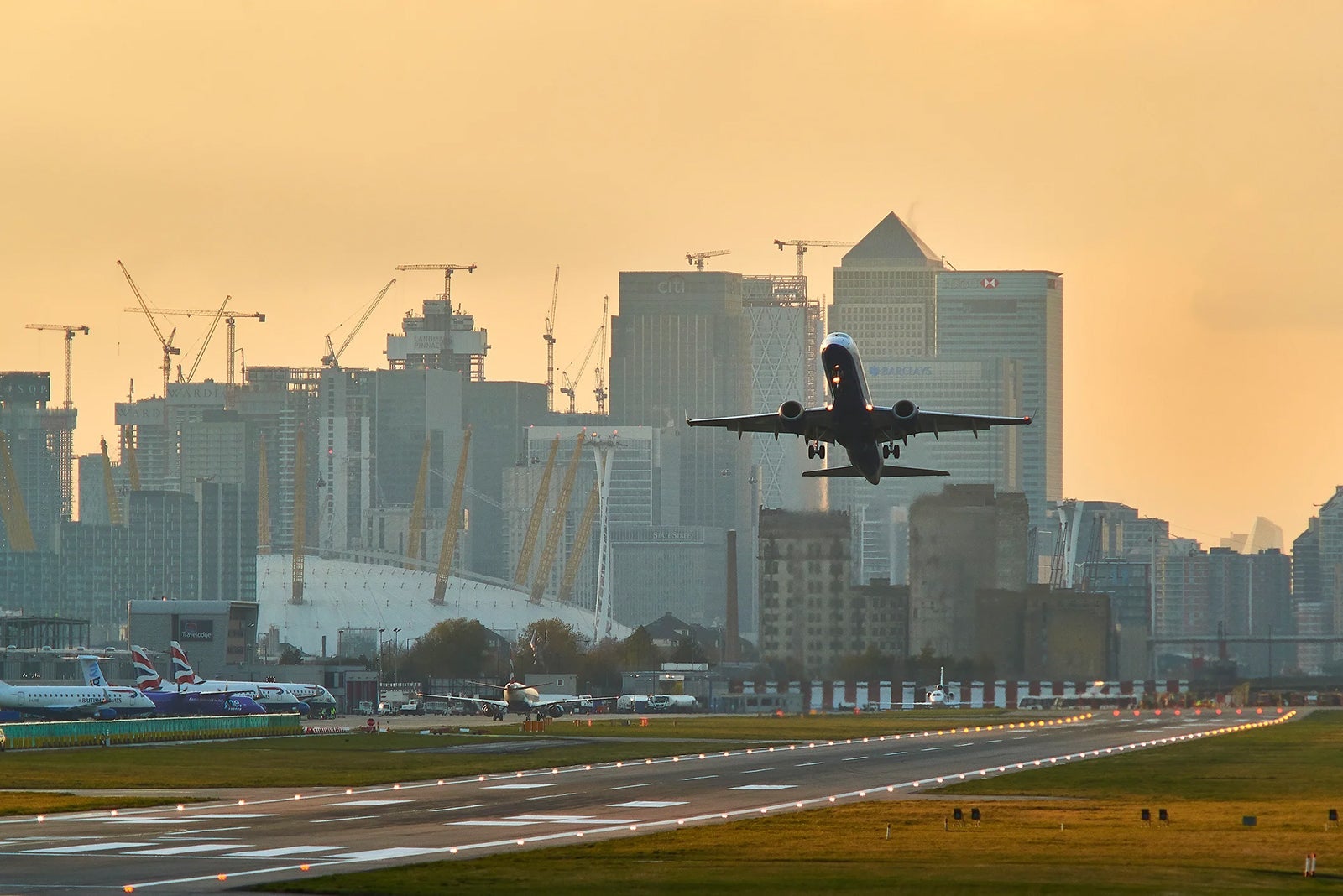 Plane taking off from airport tarmac_JOHN LAMB:GETTY IMAGES