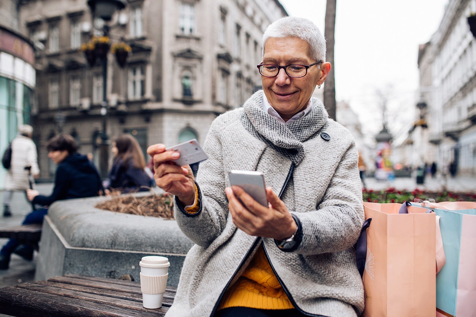 Older woman sitting on the bench