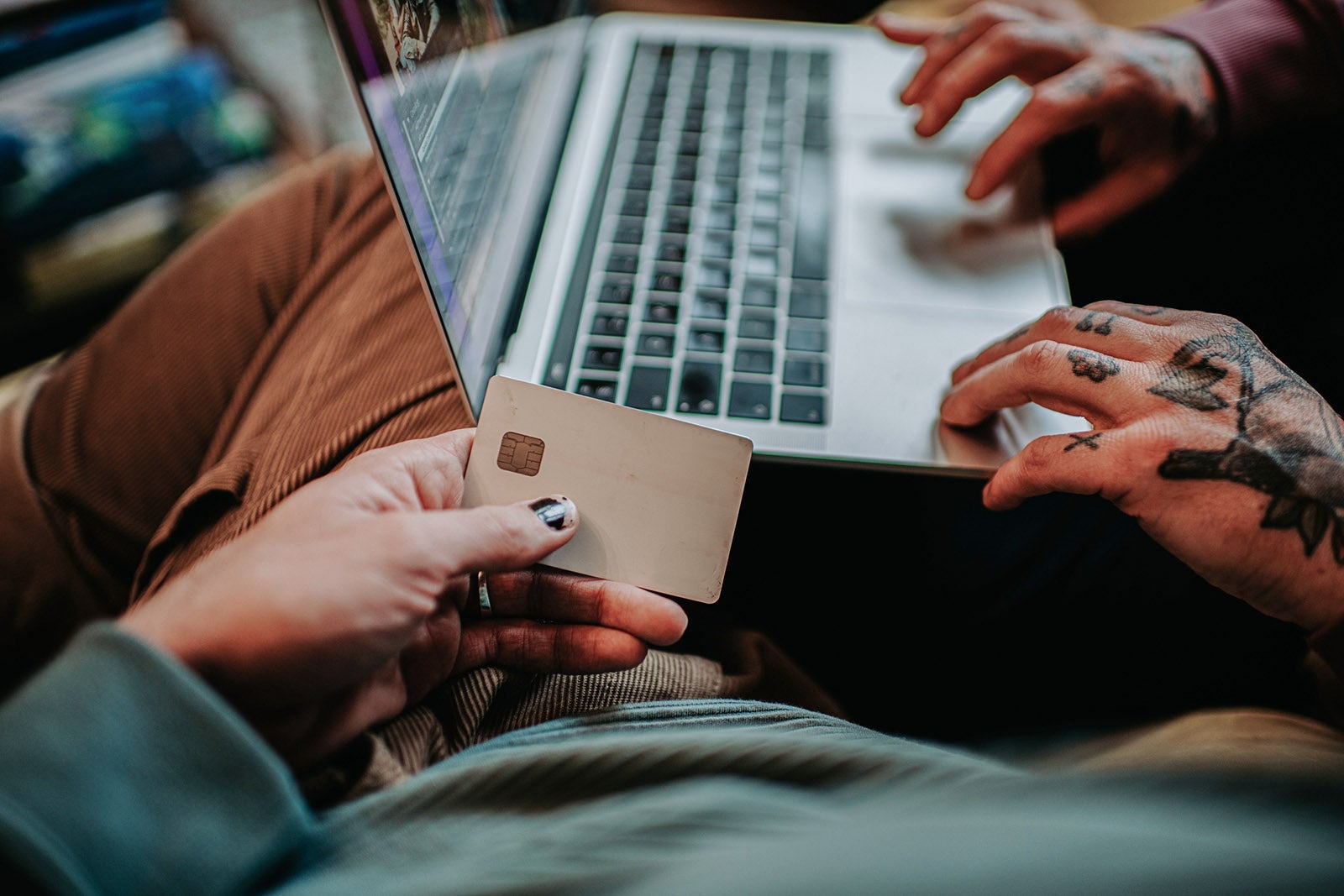 Close-up of a couple online shopping