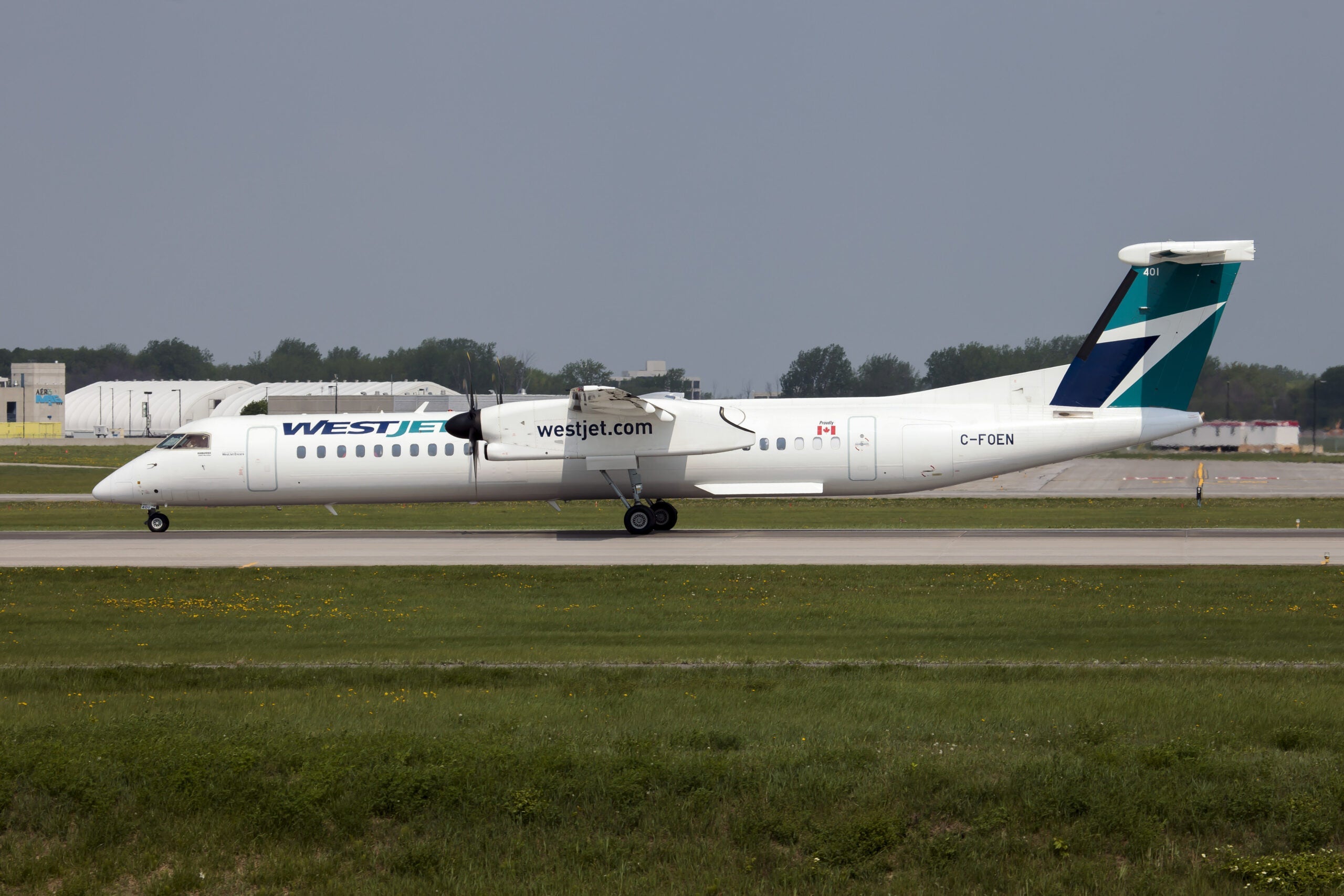 A WestJet Encore Bombardier Dash 8-Q400 landed at Montreal