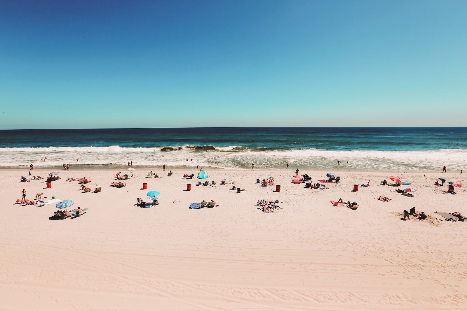 People on beach during summer vacation or spring break