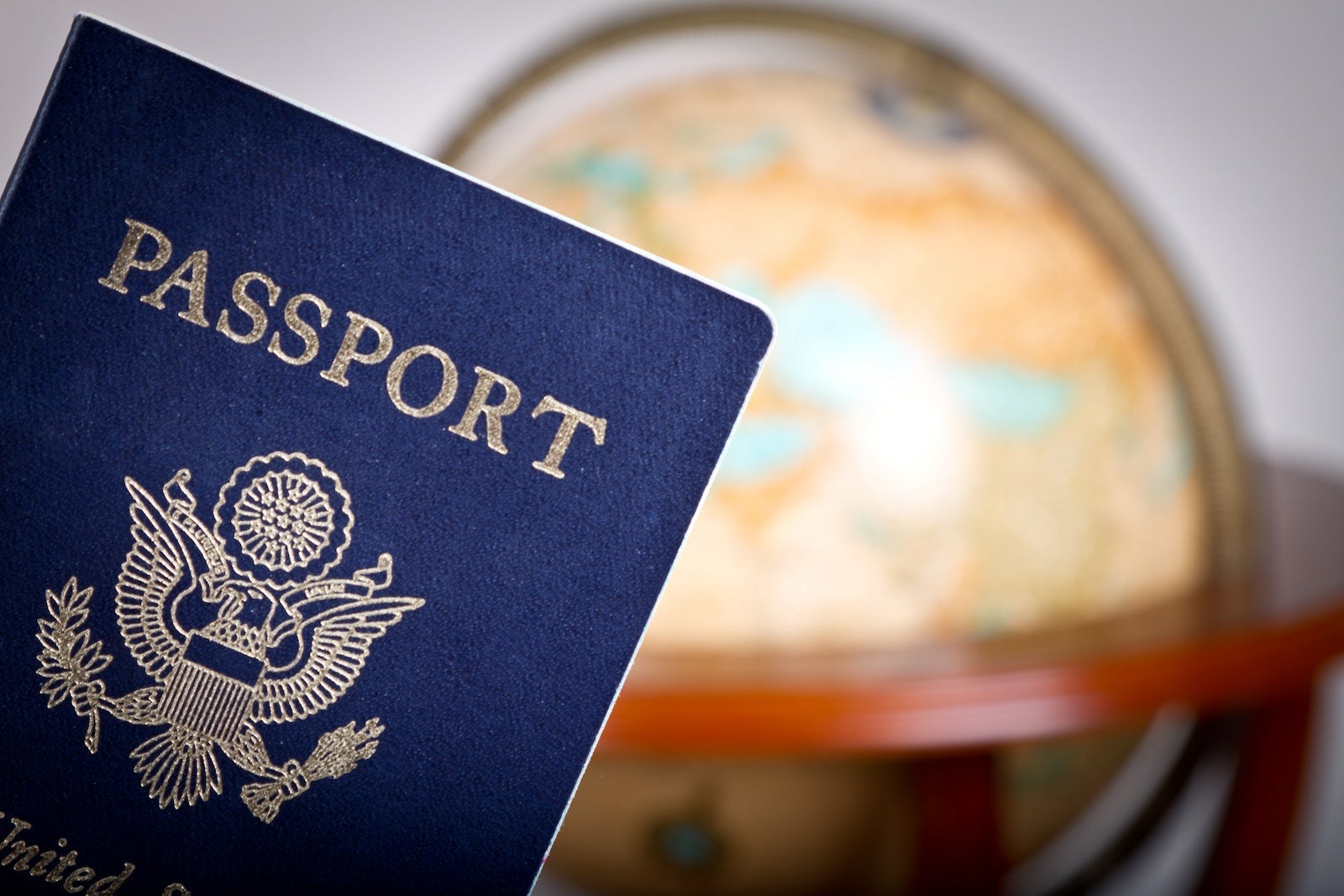 American Passport and Globe