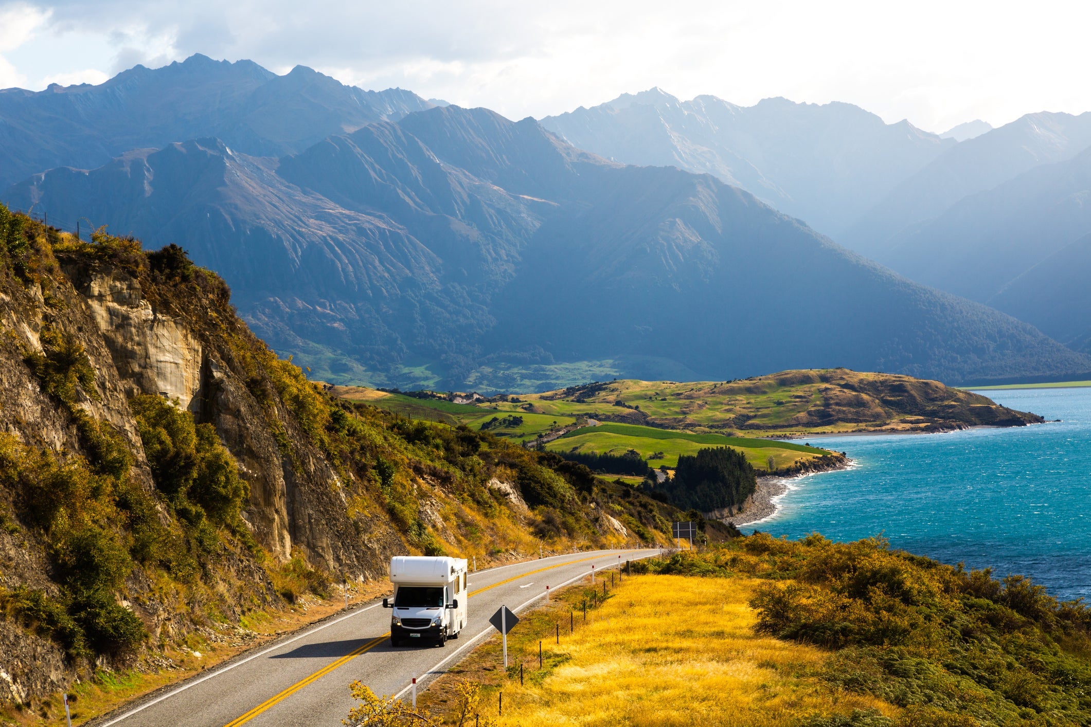 Campervan on Road by Lake Hawea