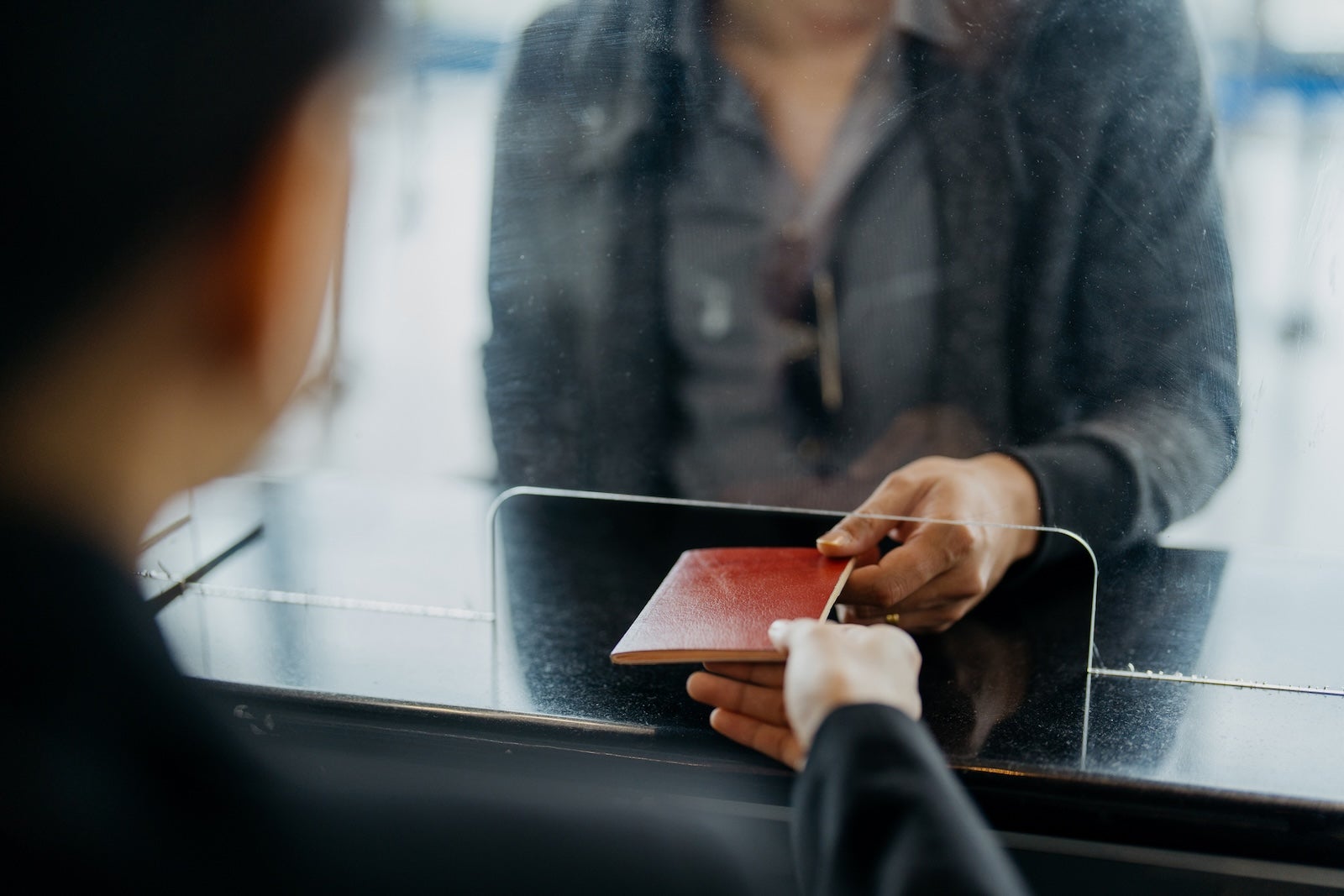 Passenger checking in at airline counter