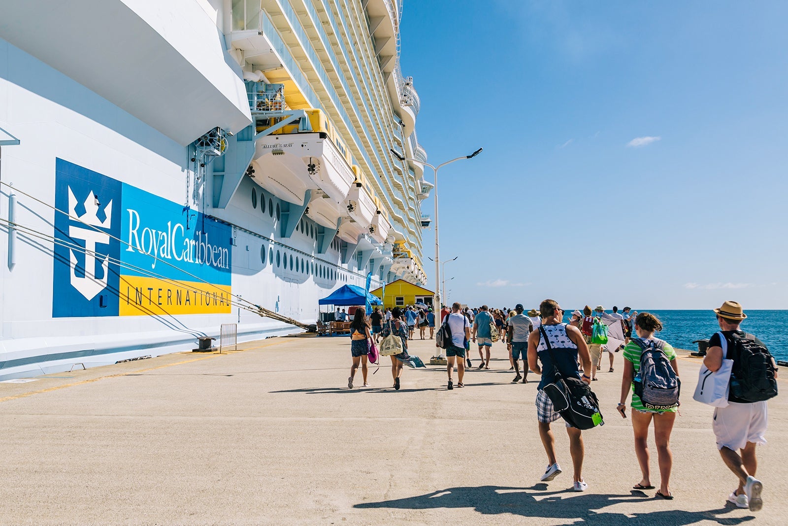 Cruise passengers returning to the Royal Caribbean Allure of the Seas cruise ship after a day at port in Phillipsburg on the island of Sint Maarten in the Caribbean Sea