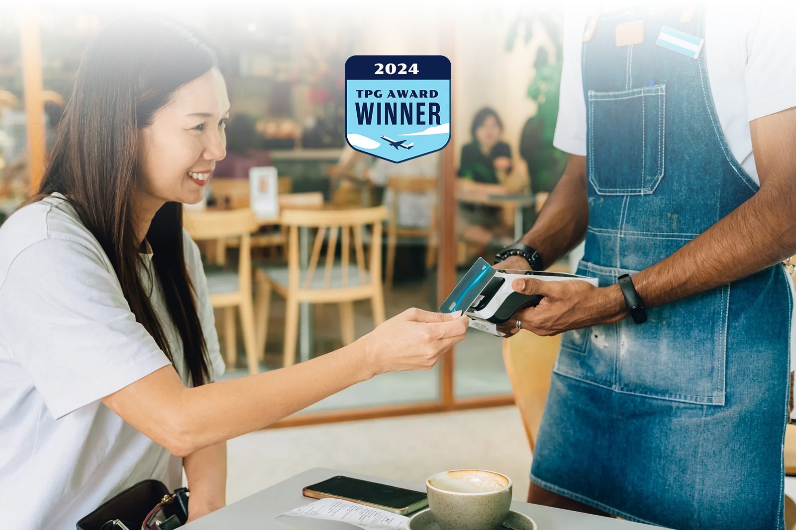 Woman-paying-for-coffee-with-credit-card_gahsoon