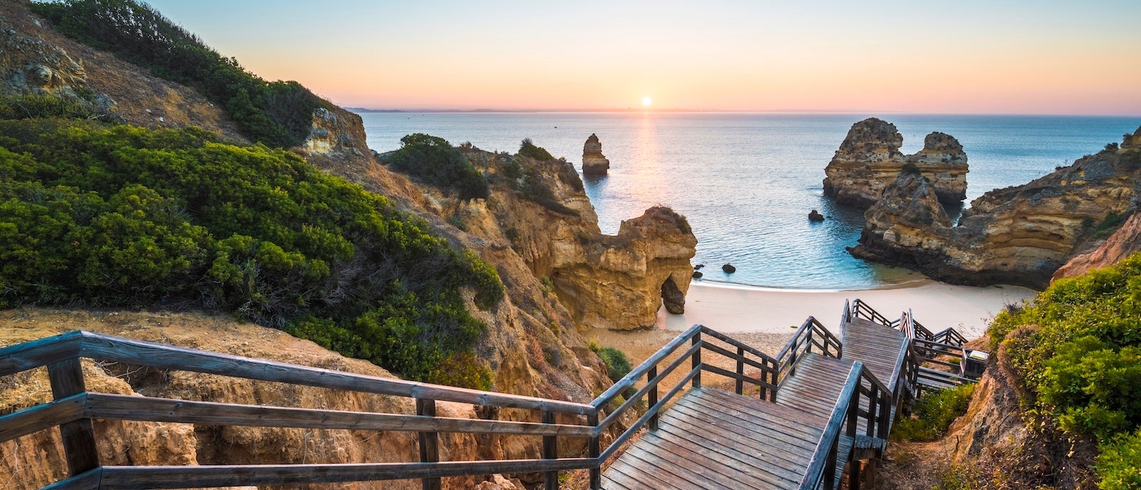 Walkway to idyllic beach, Algarve, Portugal