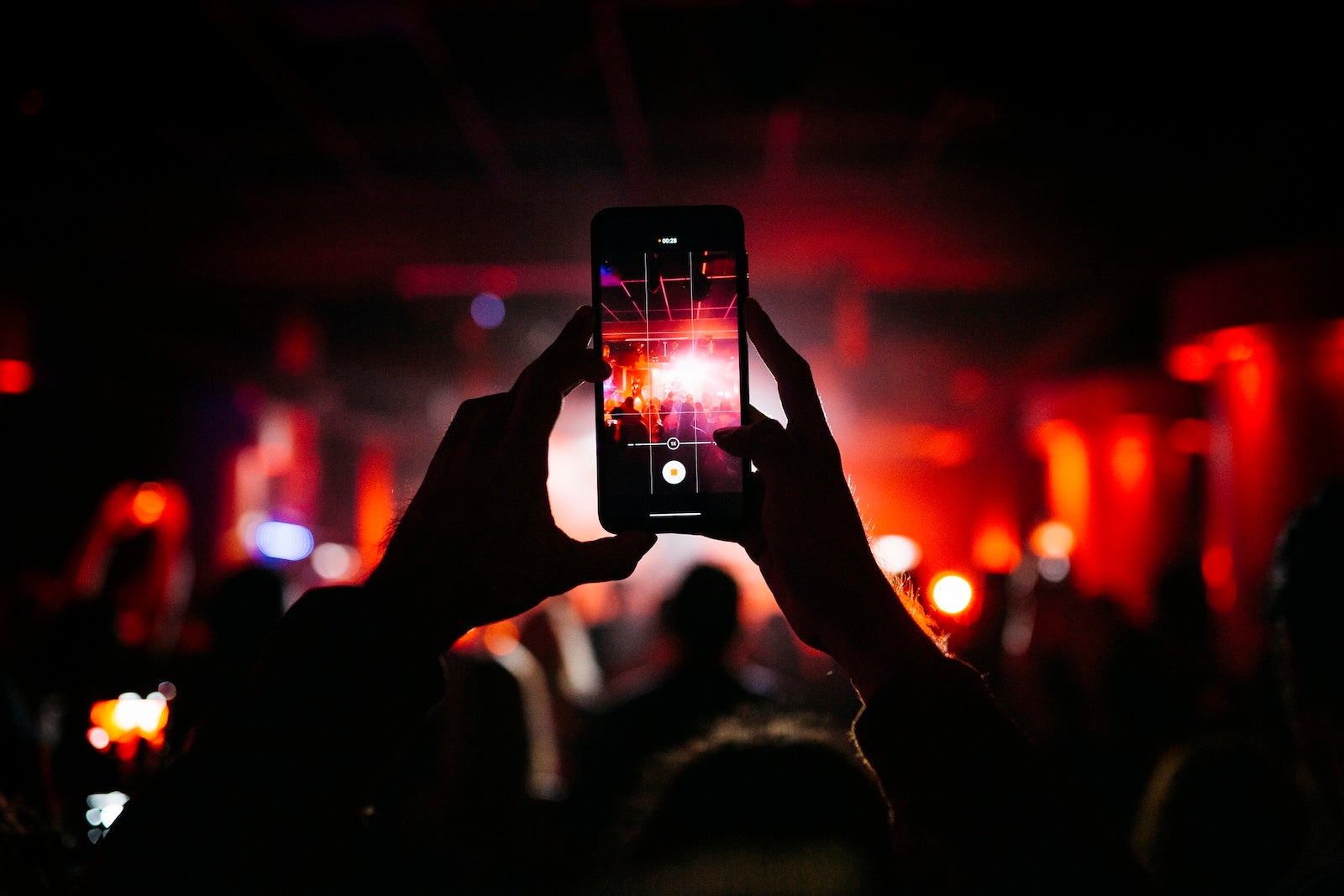 Rock band performing on stage at night club