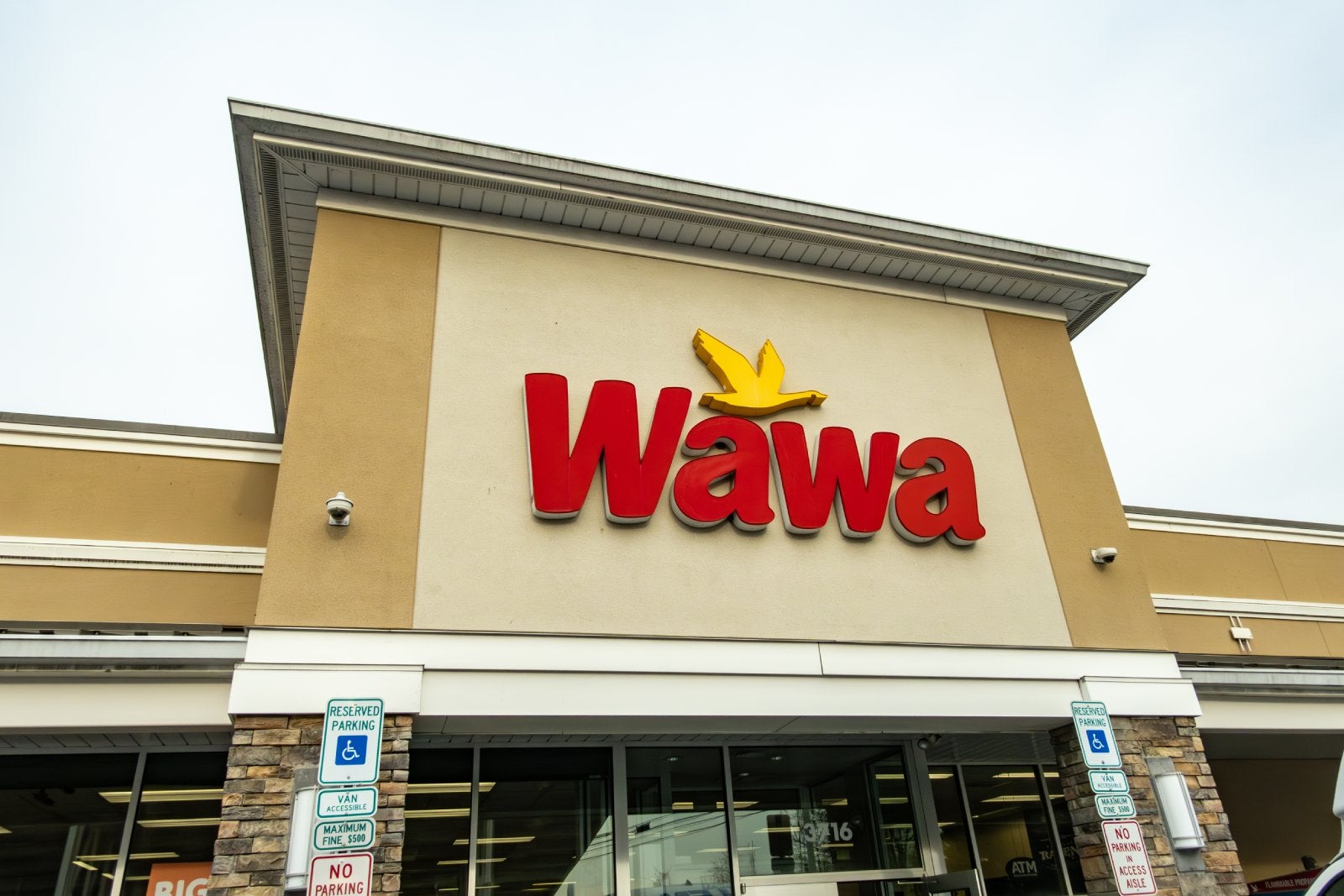 The facade and sign for the Wawa chain of gas and convenience stores.