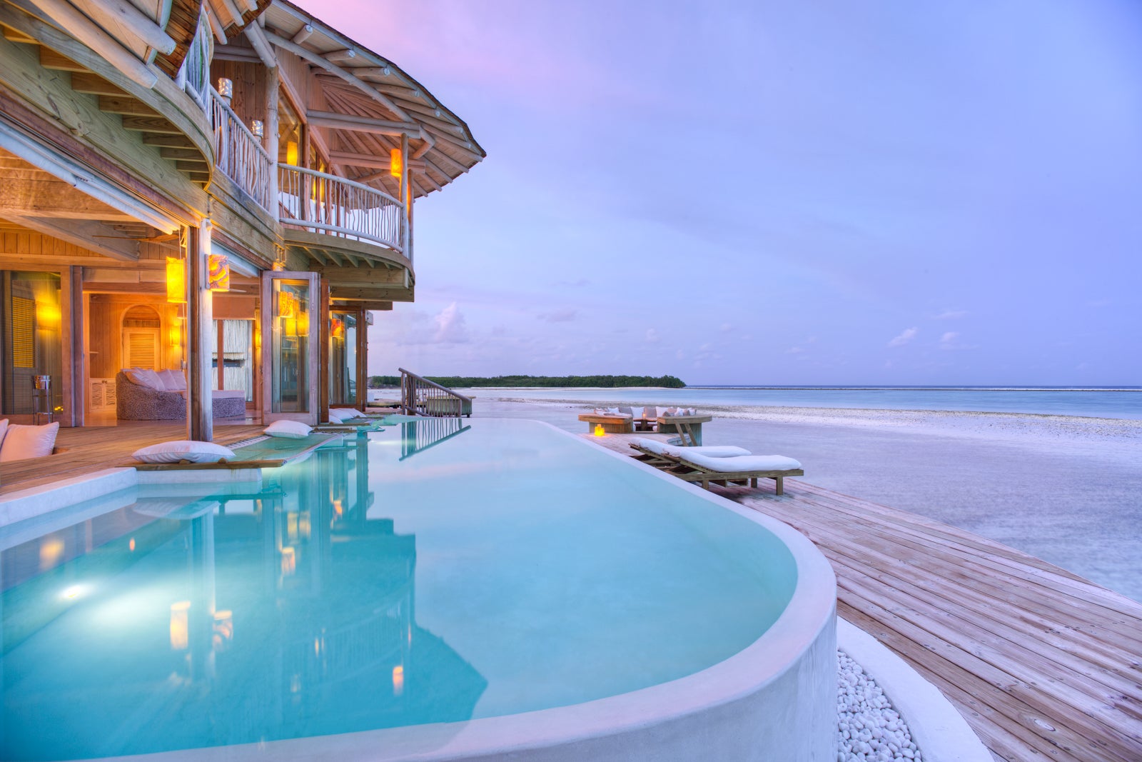 Best all-inclusive resorts with private pools for an epic getaway 17 ?url=https%3A%2F%2Fthepointsguy.global.ssl.fastly.net%2Fus%2Foriginals%2F2023%2F02%2FAll inclusive private pools Soneva Jani Maldives Bedroom Water Retreat with slide SONEVA