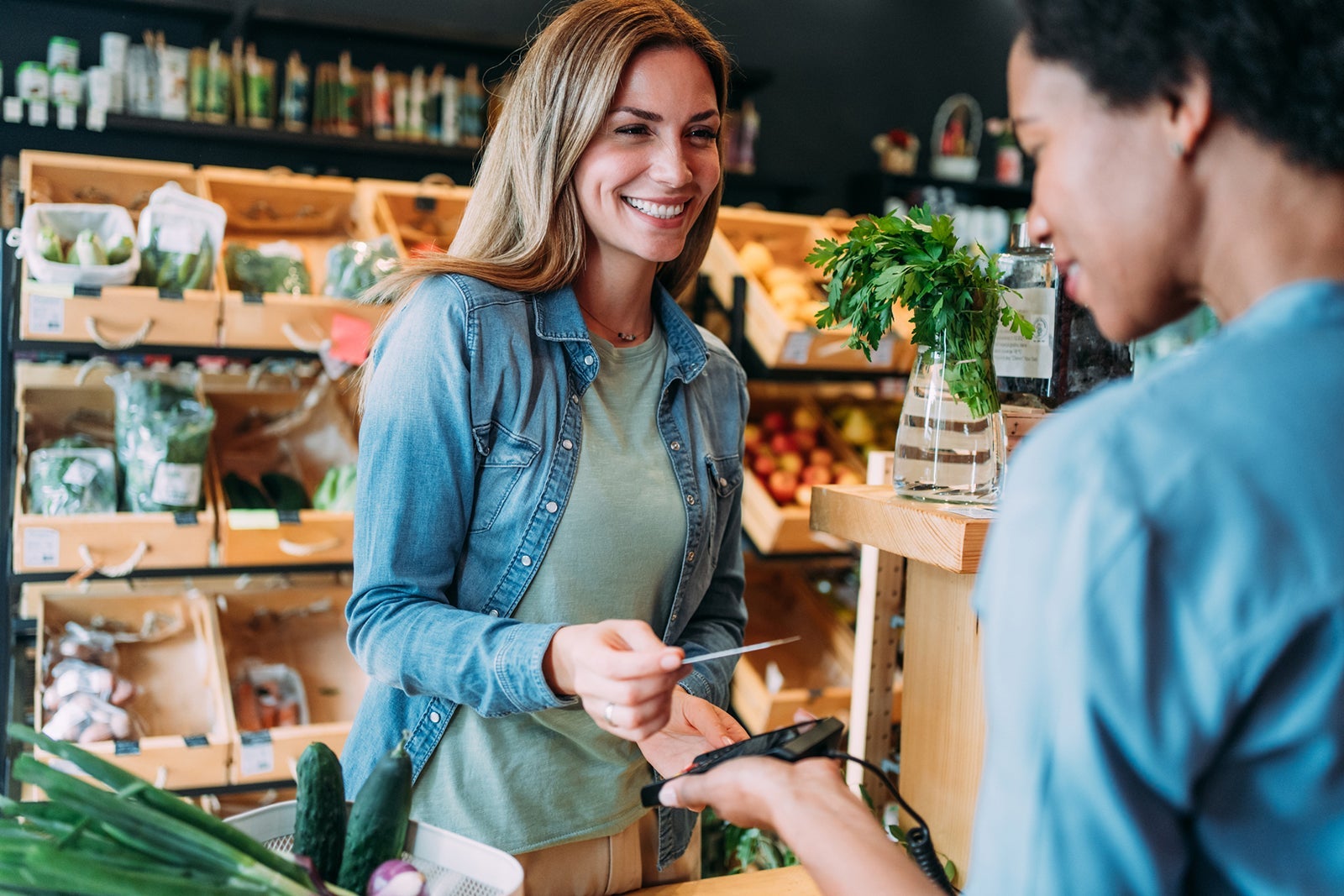 Customer paying bill using a credit card.