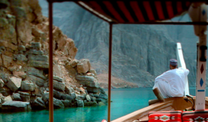 In Oman, I'd love to glide down a mountain-rimmed sea channel on an ancient boat called a dhow 