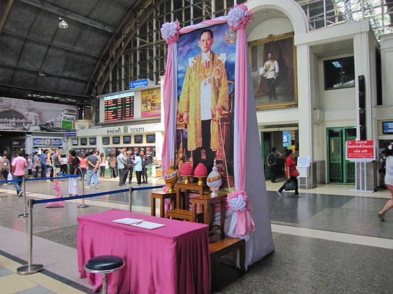 King Bhumibol Adulyadej, or Rama IX, is celebrated throughout the country, including the Hua Lamphong Rail Station.