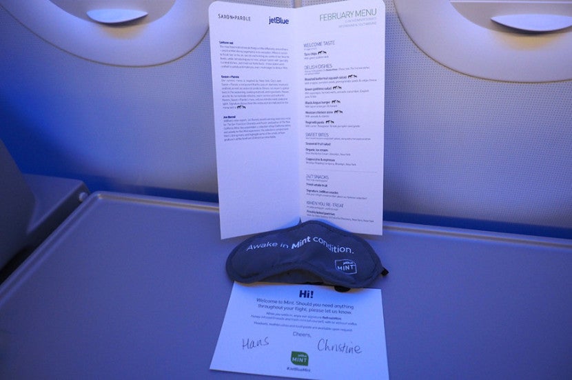 The nice food menu and a note from the great flight attendants.