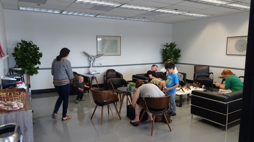 The lounge welcomed bored passengers of all ages.