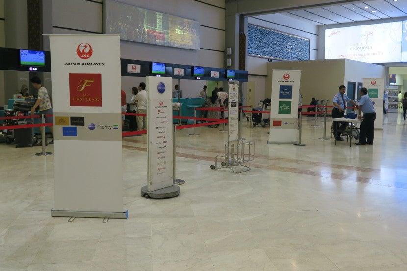 Oneworld Sapphires can use the First Class check-in at CGK.