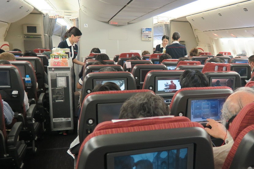 The flight attendants were friendly and careful when distributing meals and drinks.