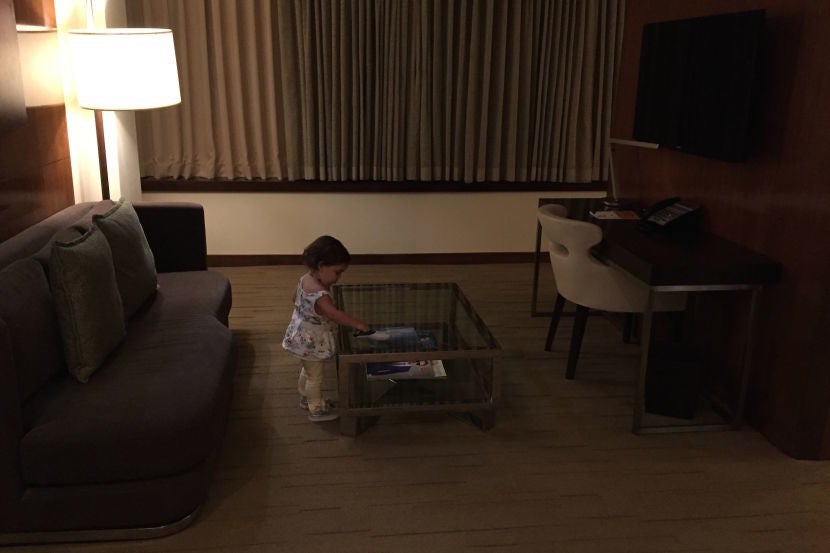 Evy was also fascinated with the glass coffee table.